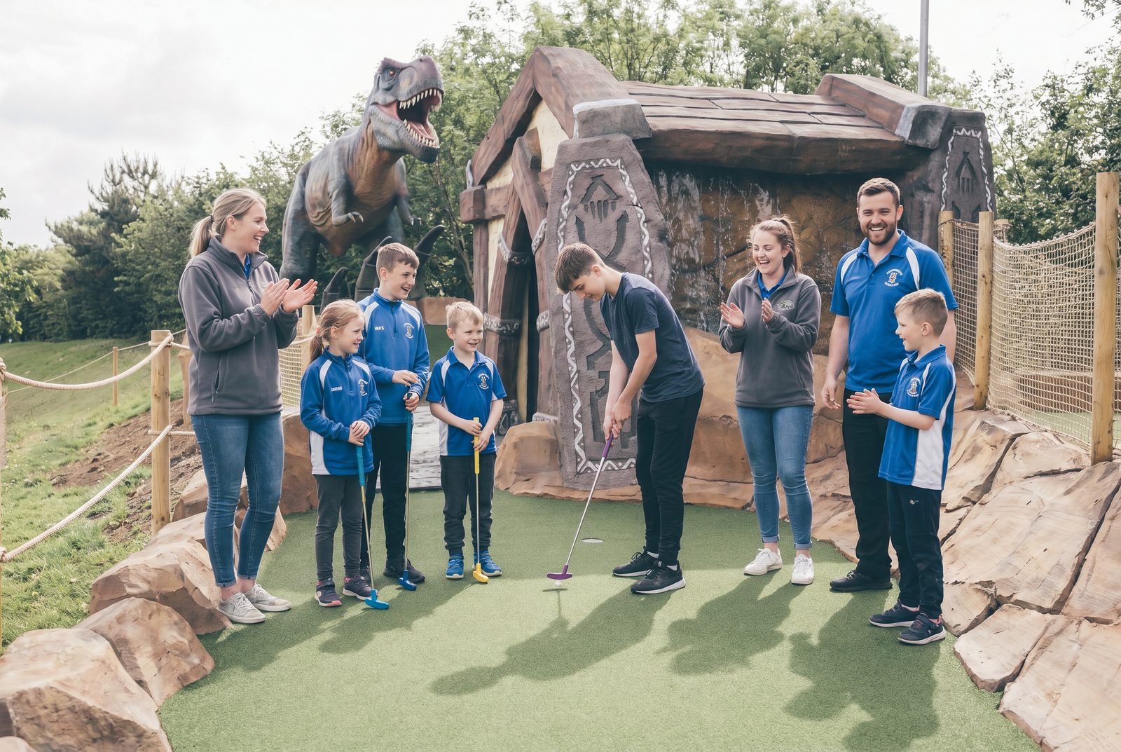 A youth club group enjoying our dinosaur adventure golf course